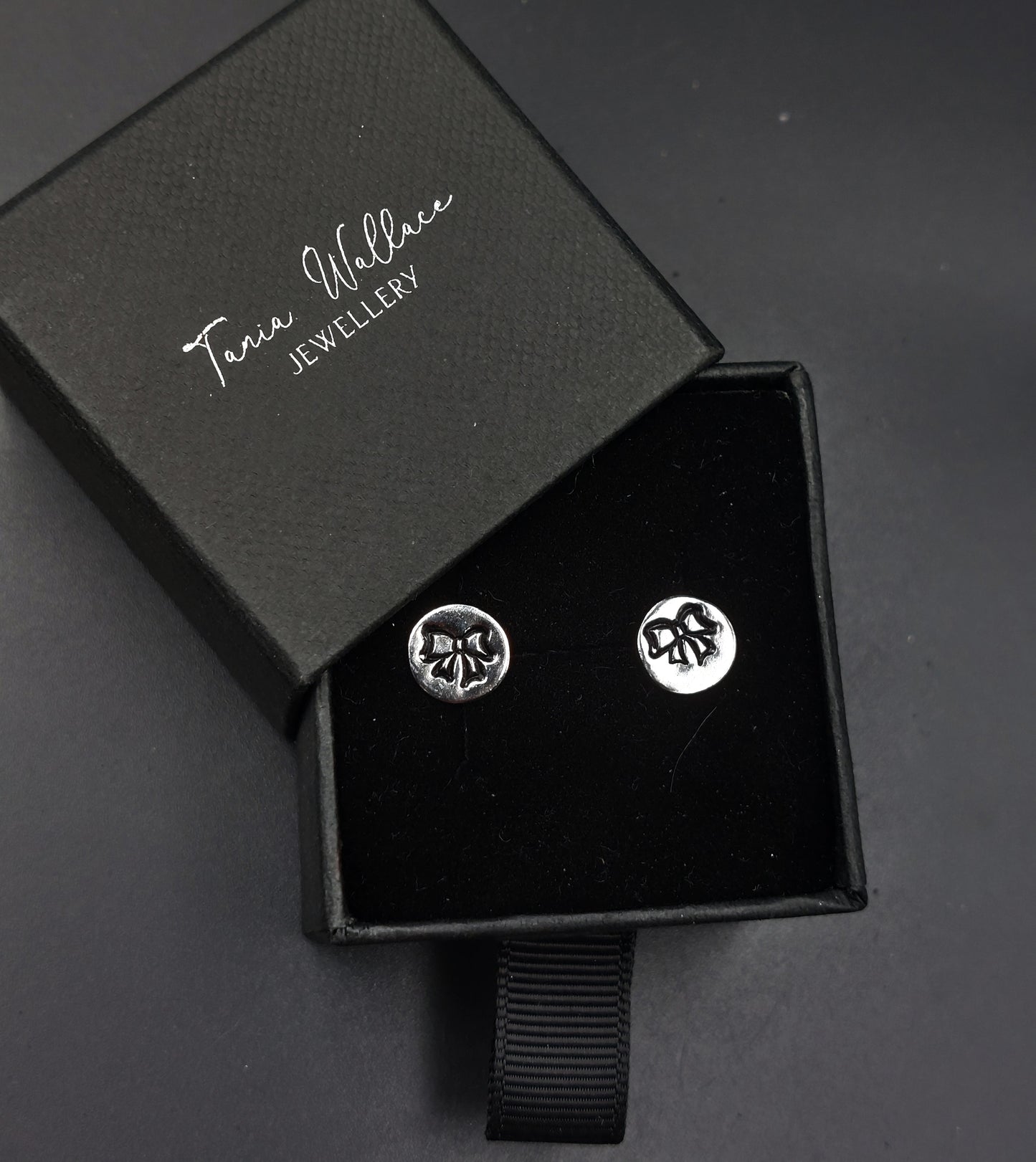 Silver Studs with Bow Design