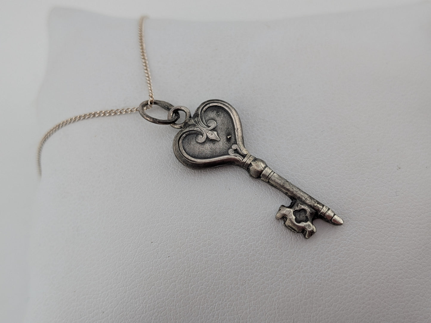 Blemished key pendant