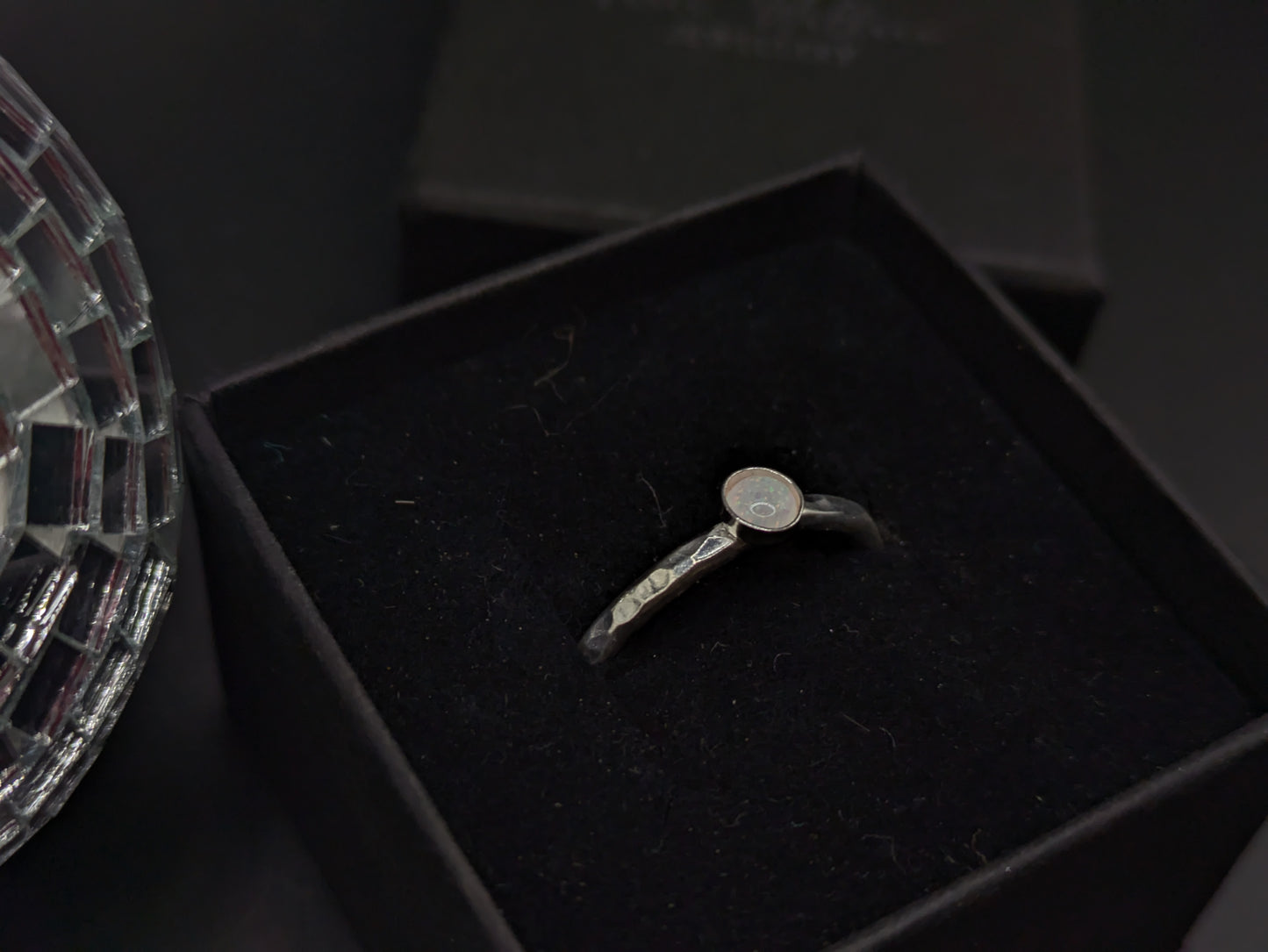 Sterling Silver Band With White and Red Opal