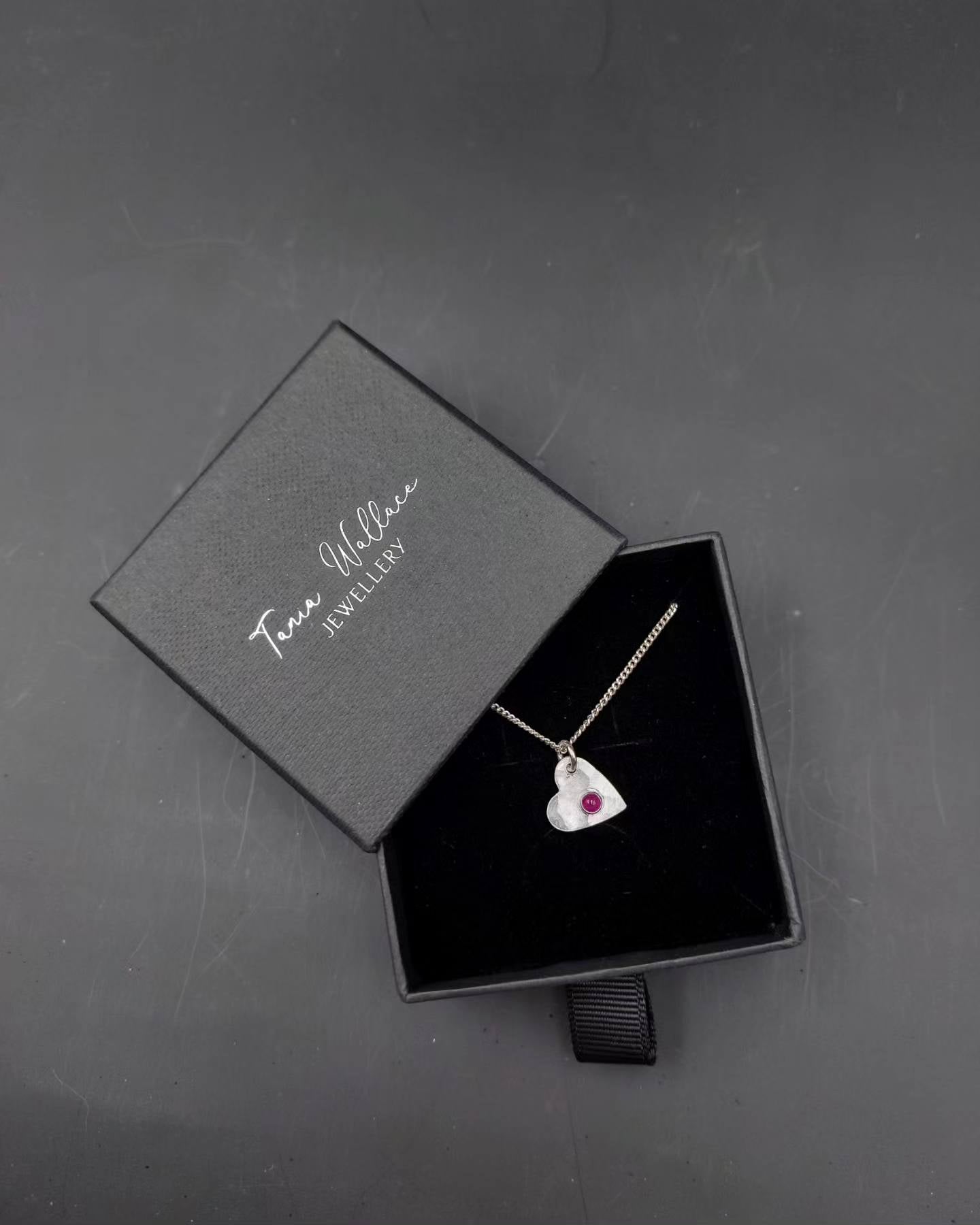 Heart pendant with ruby gemstone