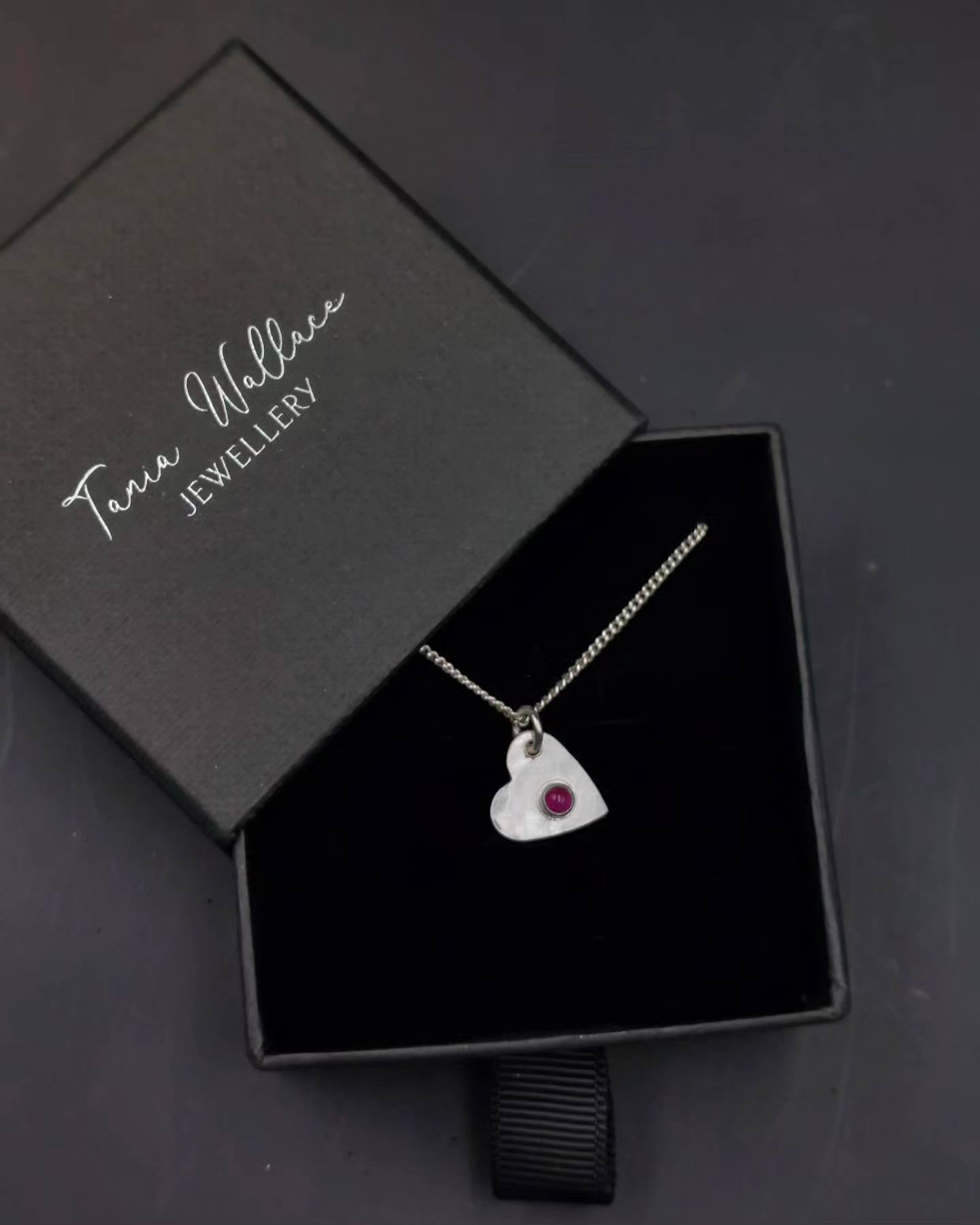 Heart pendant with ruby gemstone