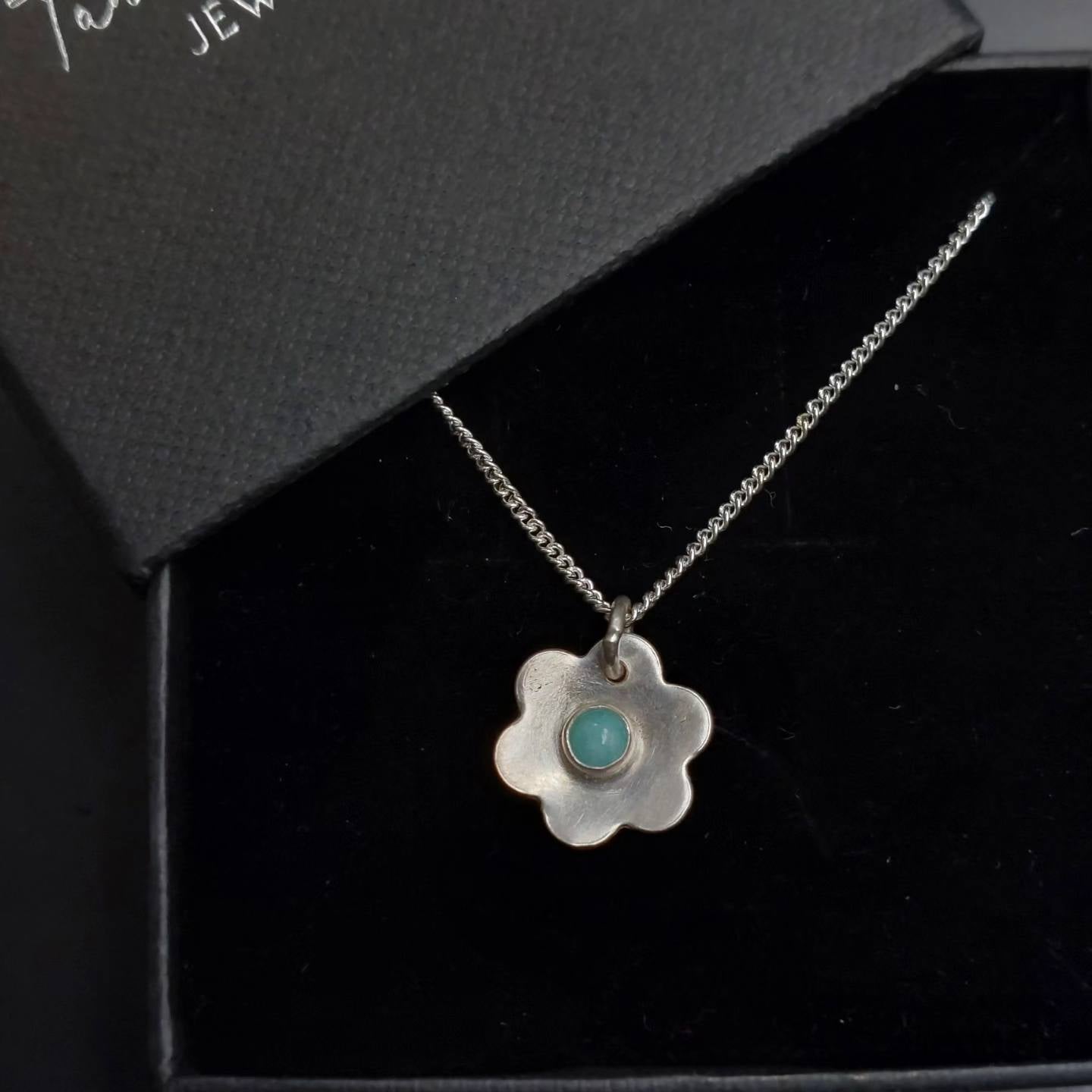 Flower pendant set with amazonite gemstone