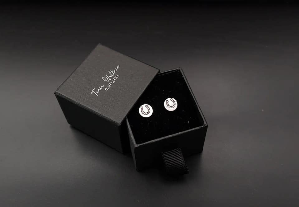 Silver studs with horseshoe design