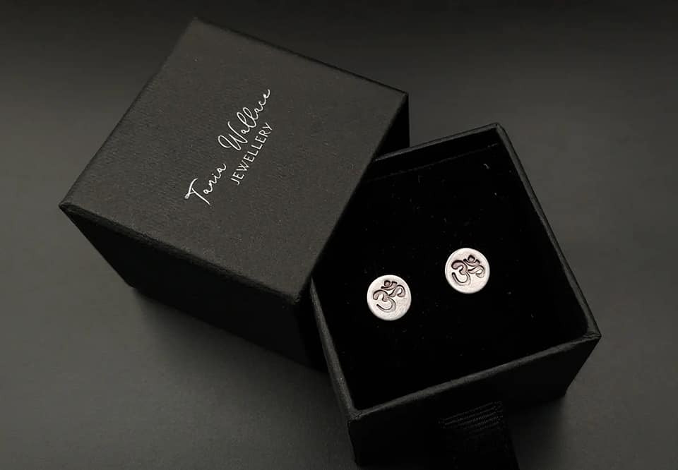 Silver studs with Om design