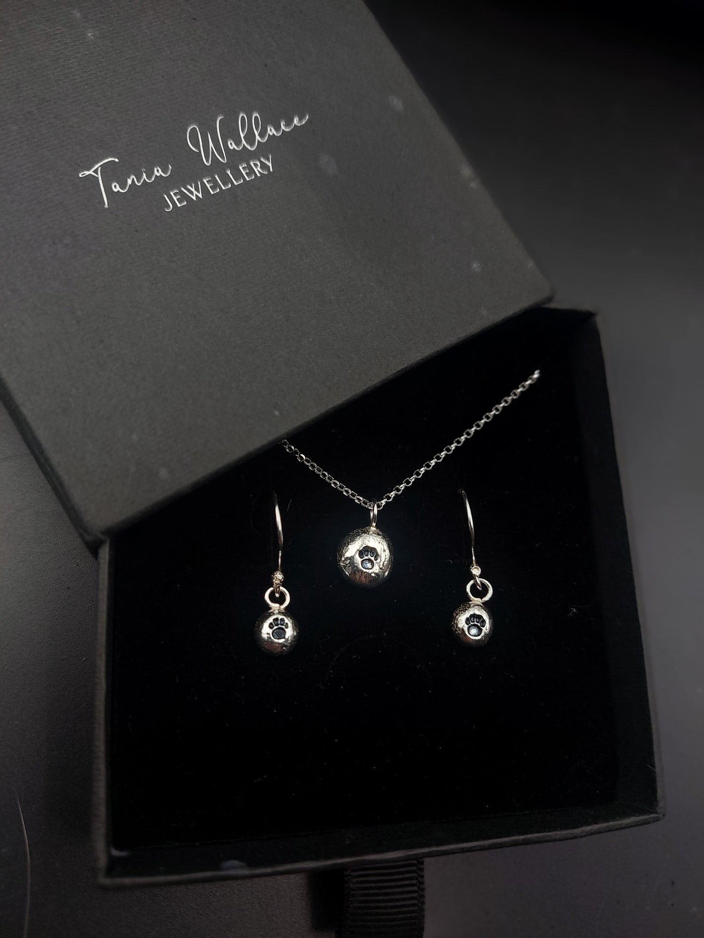 Molten Silver Pawprint Pendant