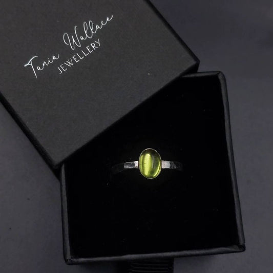 Oval peridot ring