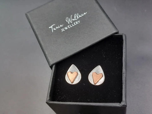 Silver teardrop studs with copper hearts