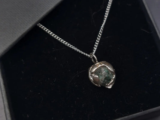 Raw emerald gemstone sand cast pendant