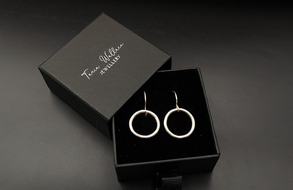 Silver hoop drops