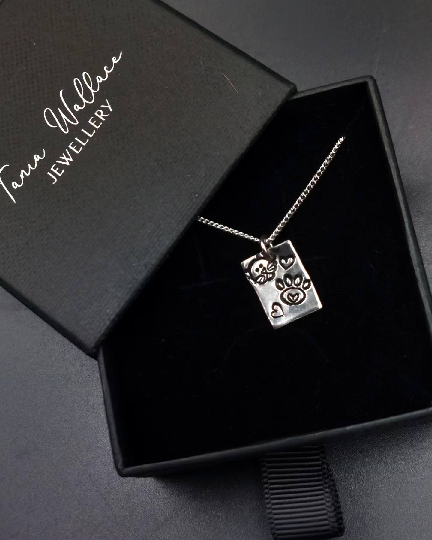 Cat and pawprint pendant
