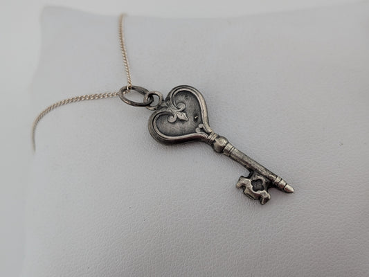 Blemished key pendant