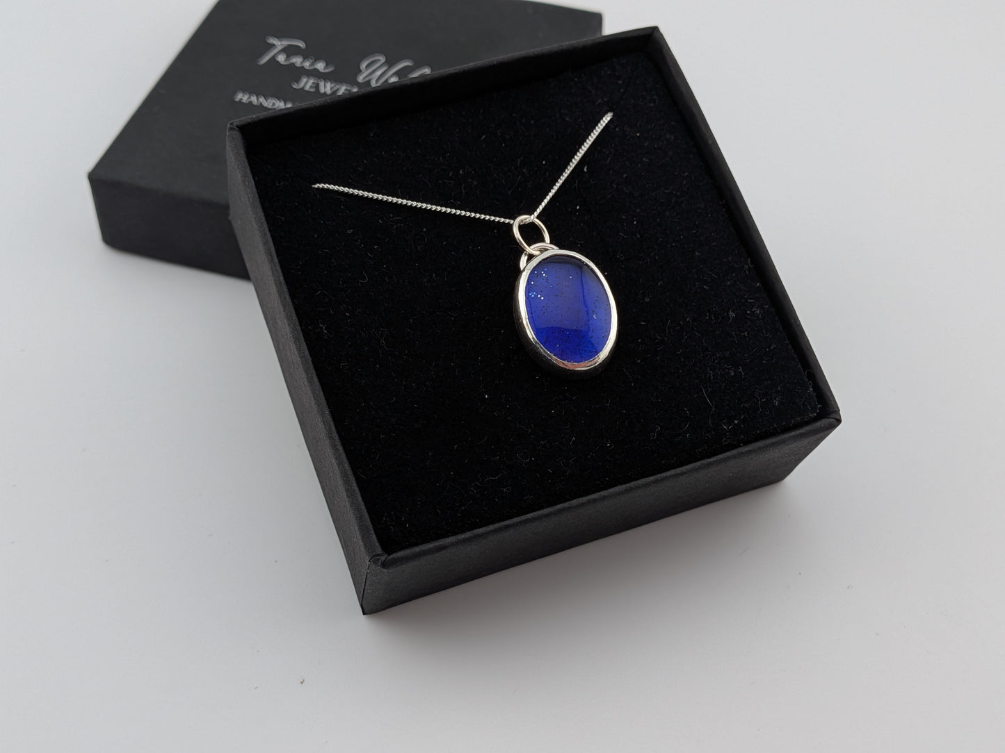 Blue Glitter Bowlerite Oval Pendant