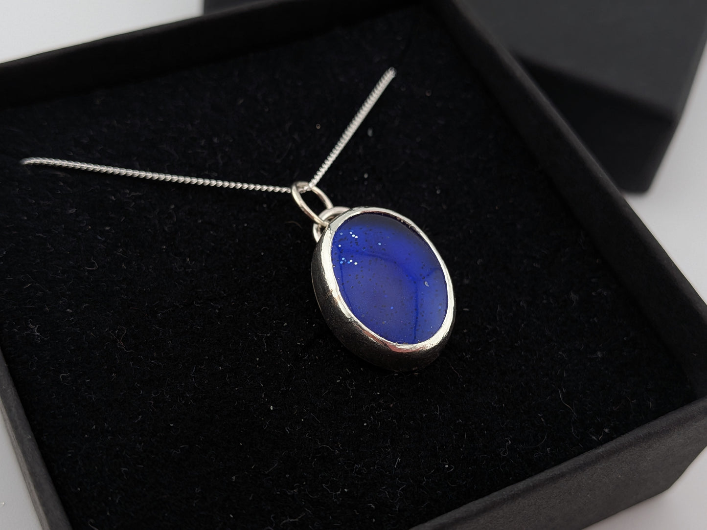 Blue Glitter Bowlerite Oval Pendant