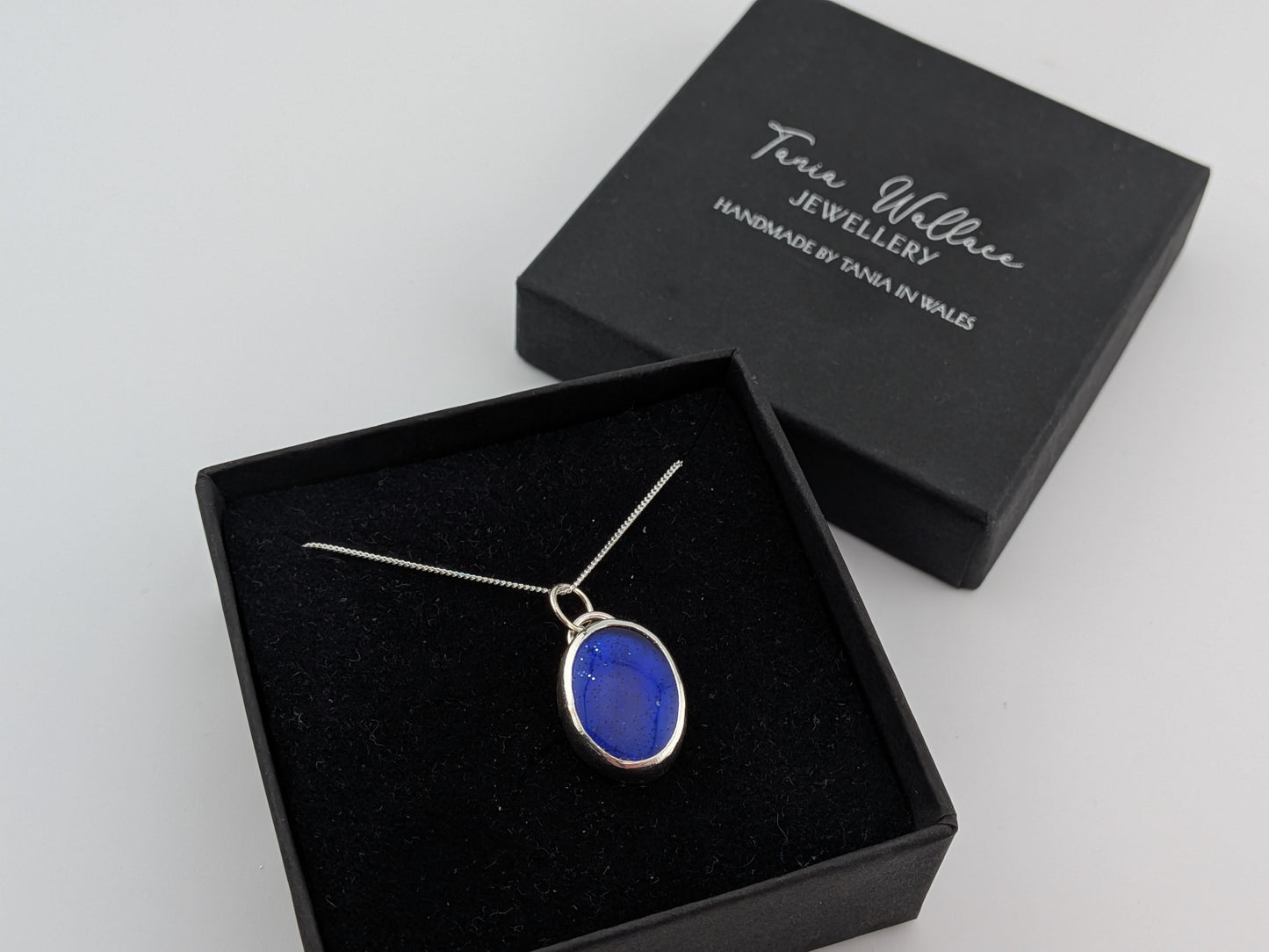 Blue Glitter Bowlerite Oval Pendant