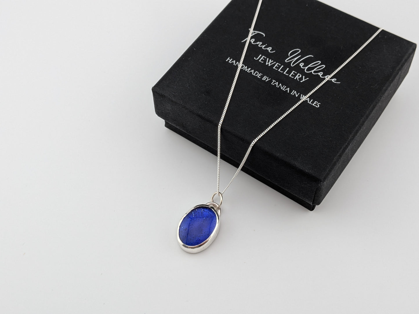 Blue Glitter Bowlerite Oval Pendant