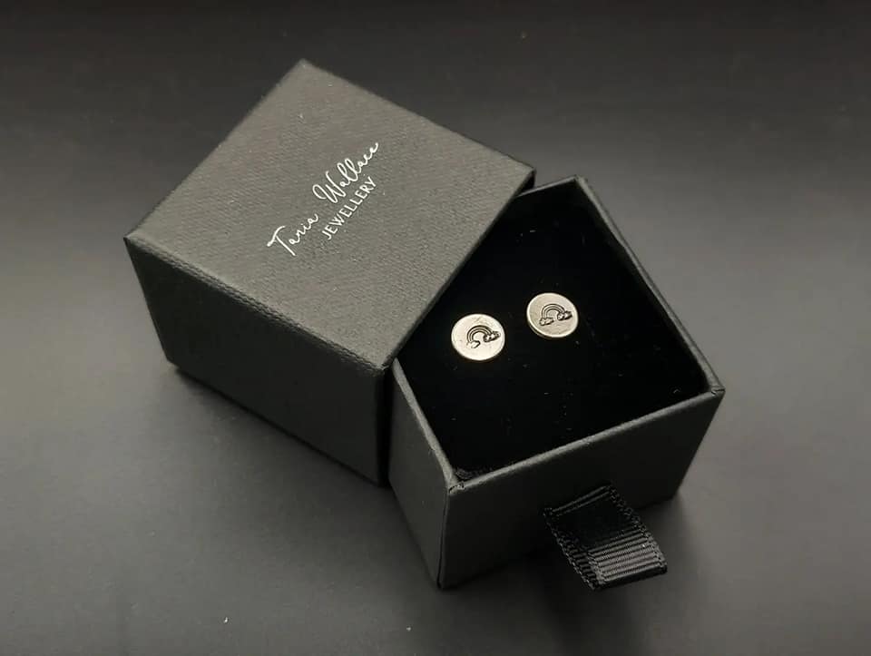 Silver studs with rainbow design